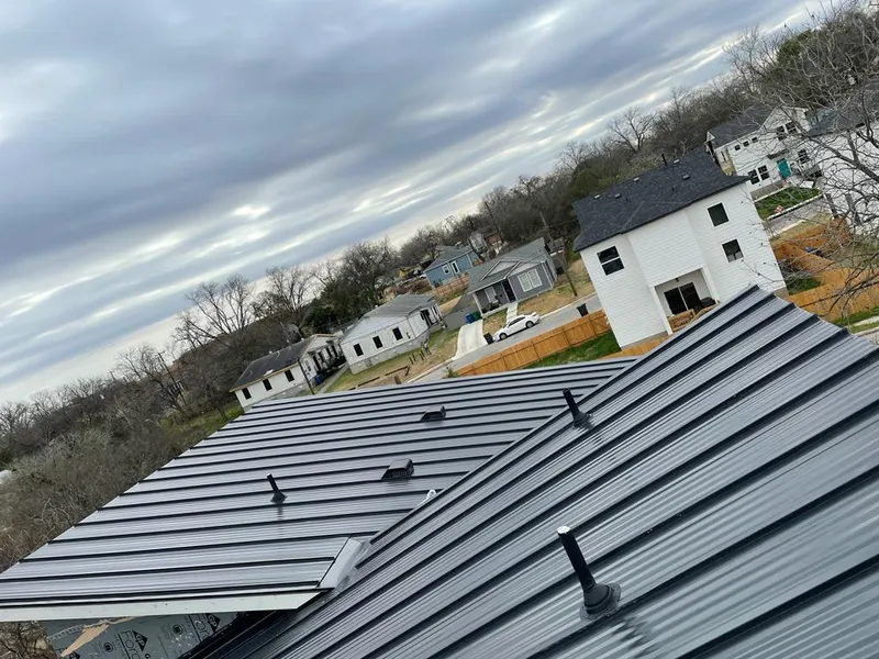 Standing seam metal roof panels with vents for Skylight Repair in Houston